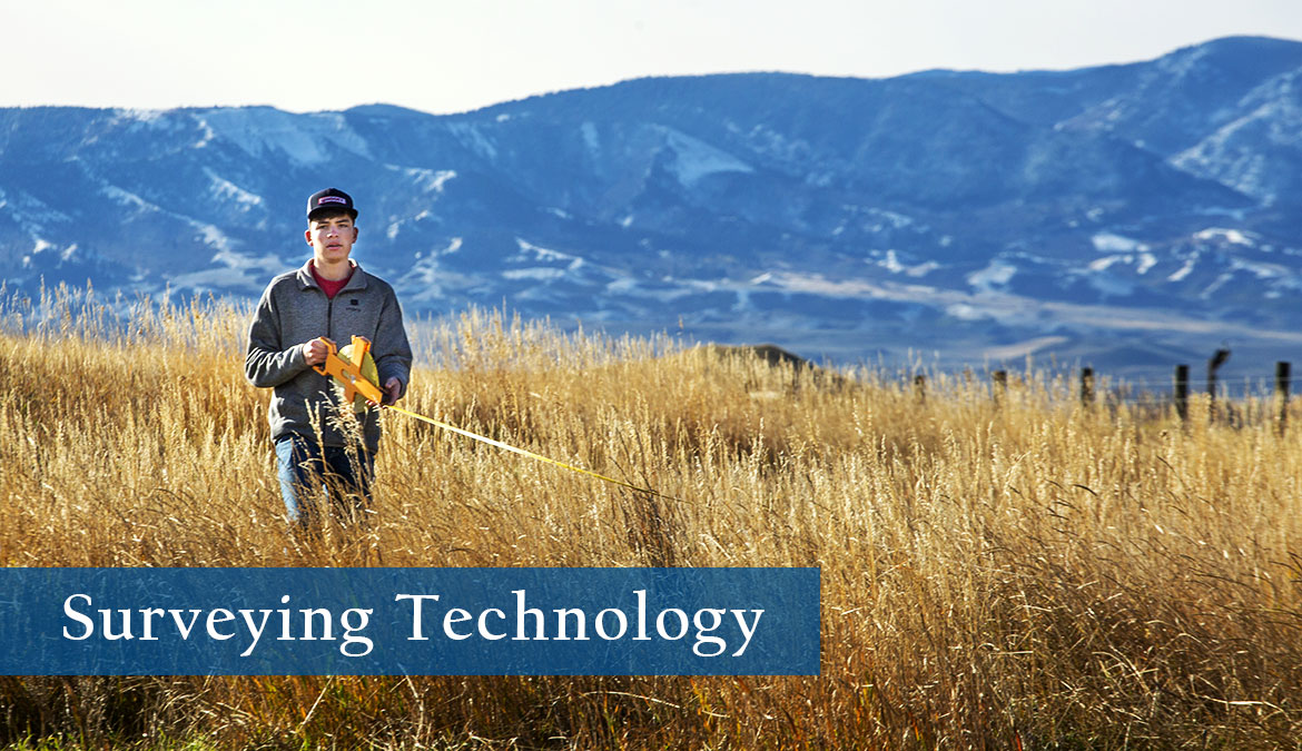 Surveying-Tech Sheridan College student in the field photo